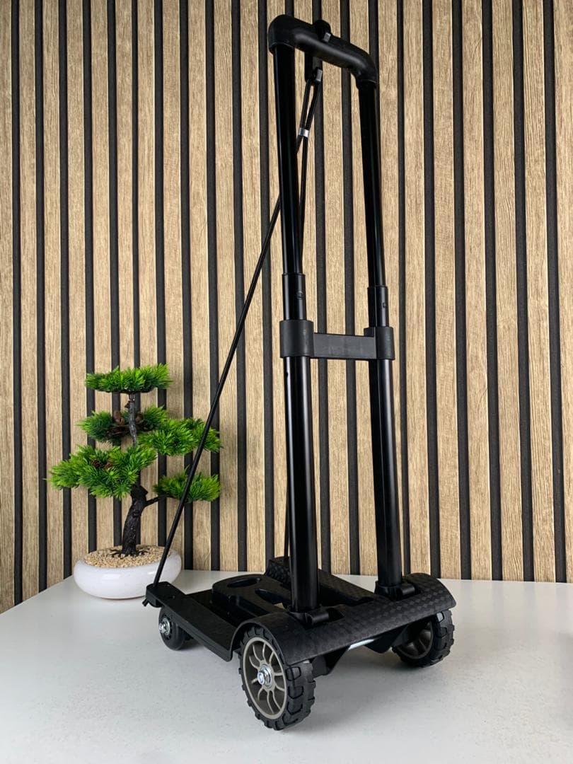 Chariot de manutention pliable et léger à 2 roues avec cordes élastiques – عربة خفيفة الوزن وقابلة للطي ذات عجلتين مع حبال مرنة - Divers - صورة حقيقية 9